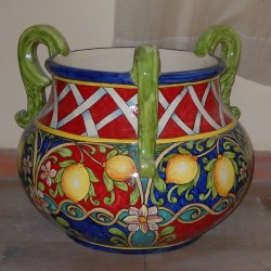 vaso base tavolo decoro limoni su fondo rosso e blu
